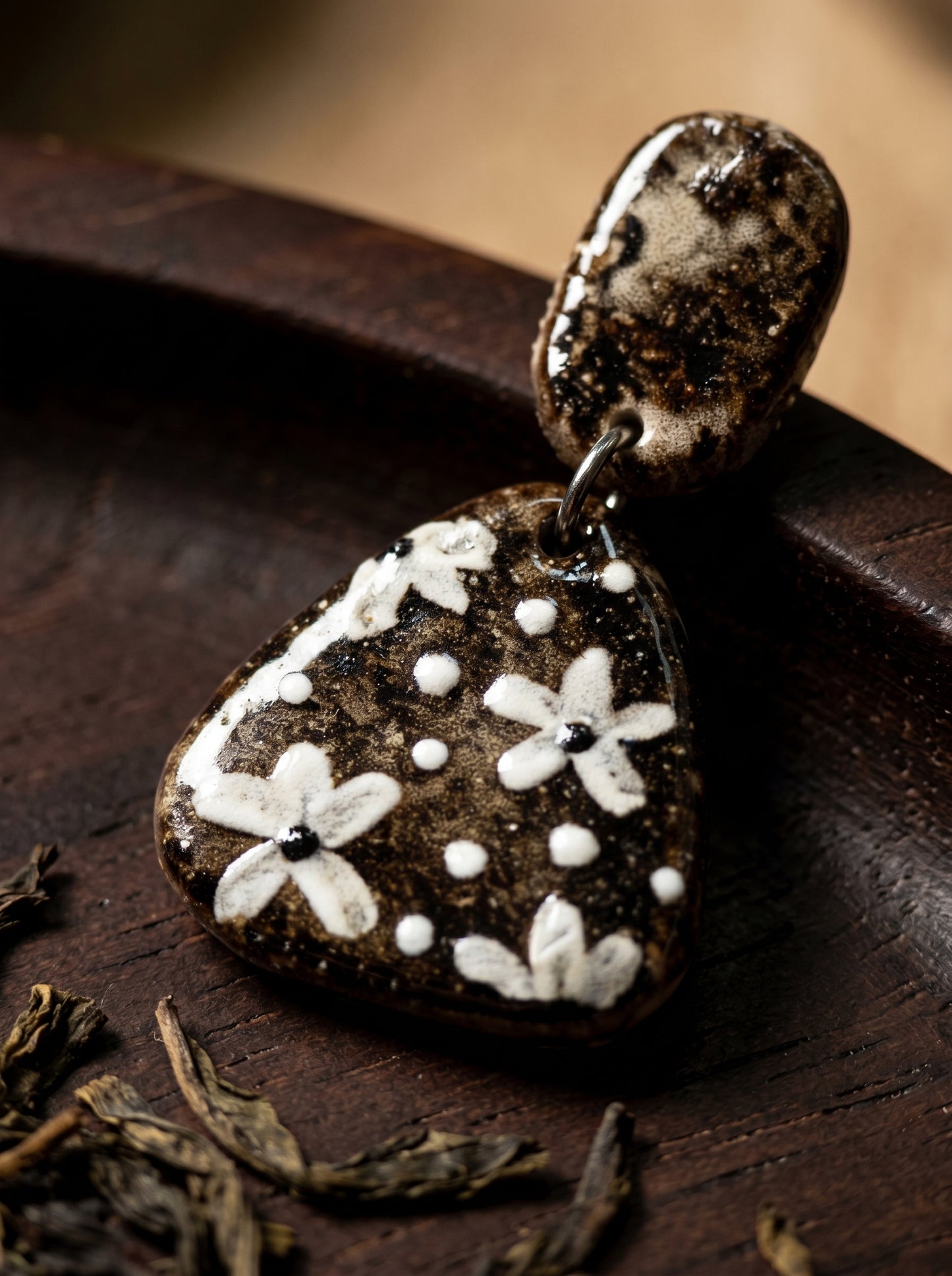 HECROWN polka dot ceramic earrings packaged in a kraft gift box with a black ribbon. A perfect anniversary or Valentine's Day gift featuring sincere artisan craftsmanship.