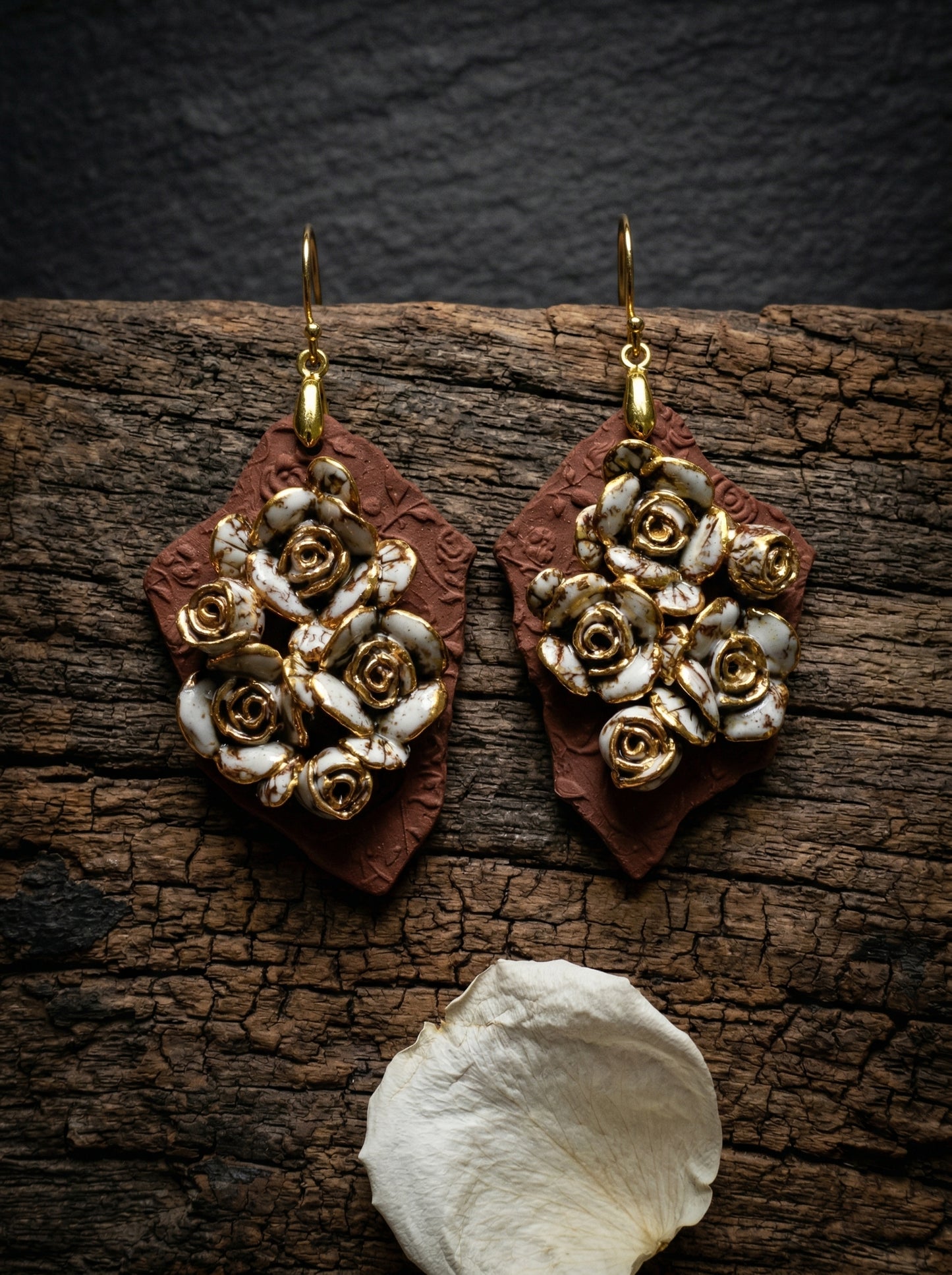 HECROWN 007 ceramic earrings on emerald green velvet with a pearl necklace and a vintage letter sealed with gold wax, evoking a nostalgic and high-end aesthetic.