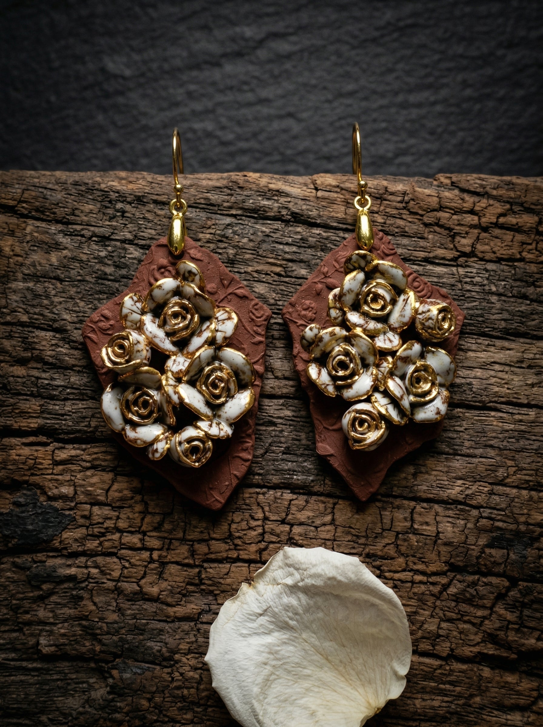 HECROWN 007 ceramic earrings on emerald green velvet with a pearl necklace and a vintage letter sealed with gold wax, evoking a nostalgic and high-end aesthetic.