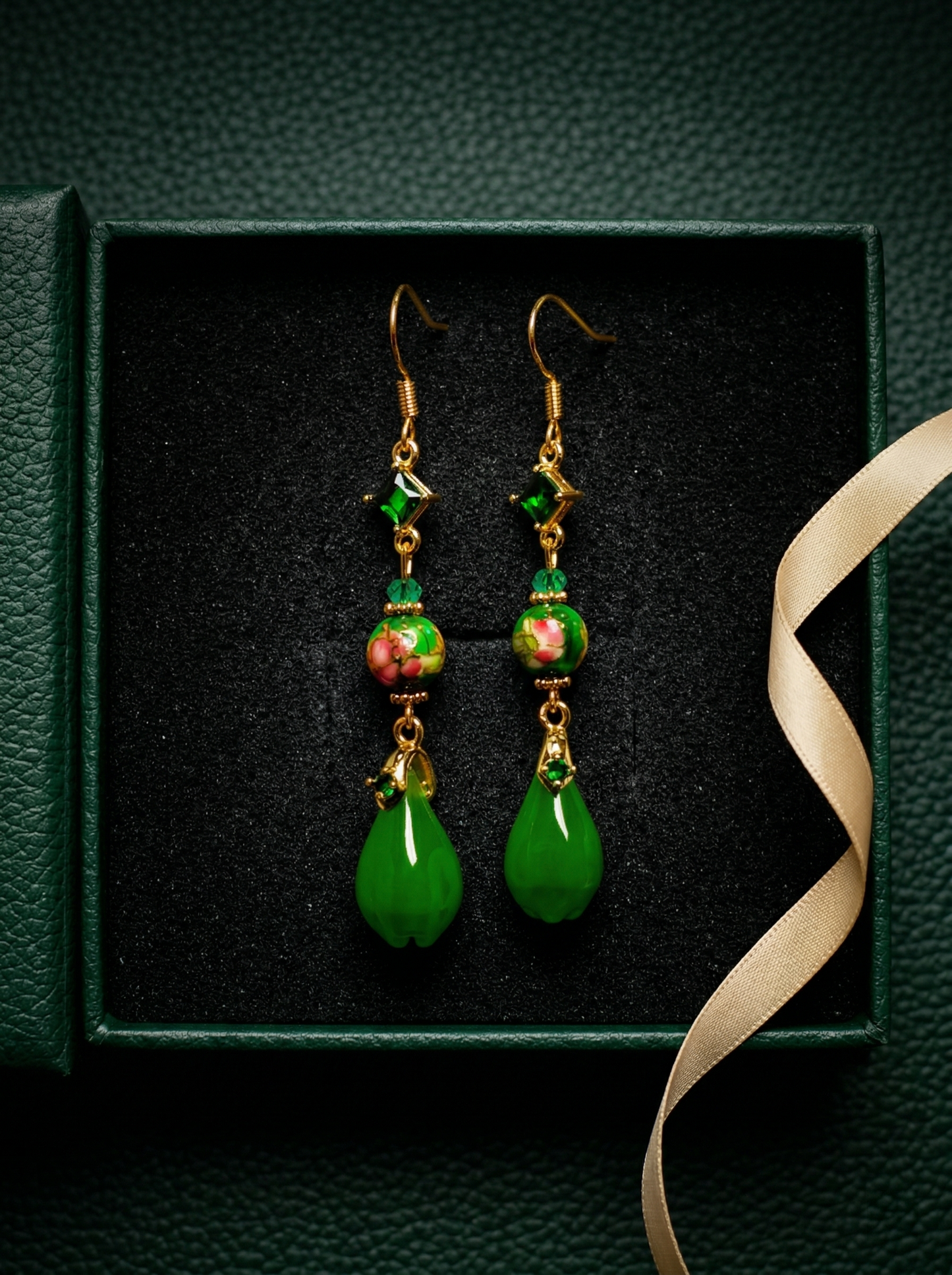 HECROWN long emerald ceramic earrings in a dark green leather gift box with a ribbon. A premium anniversary or Valentine's Day gift for her.