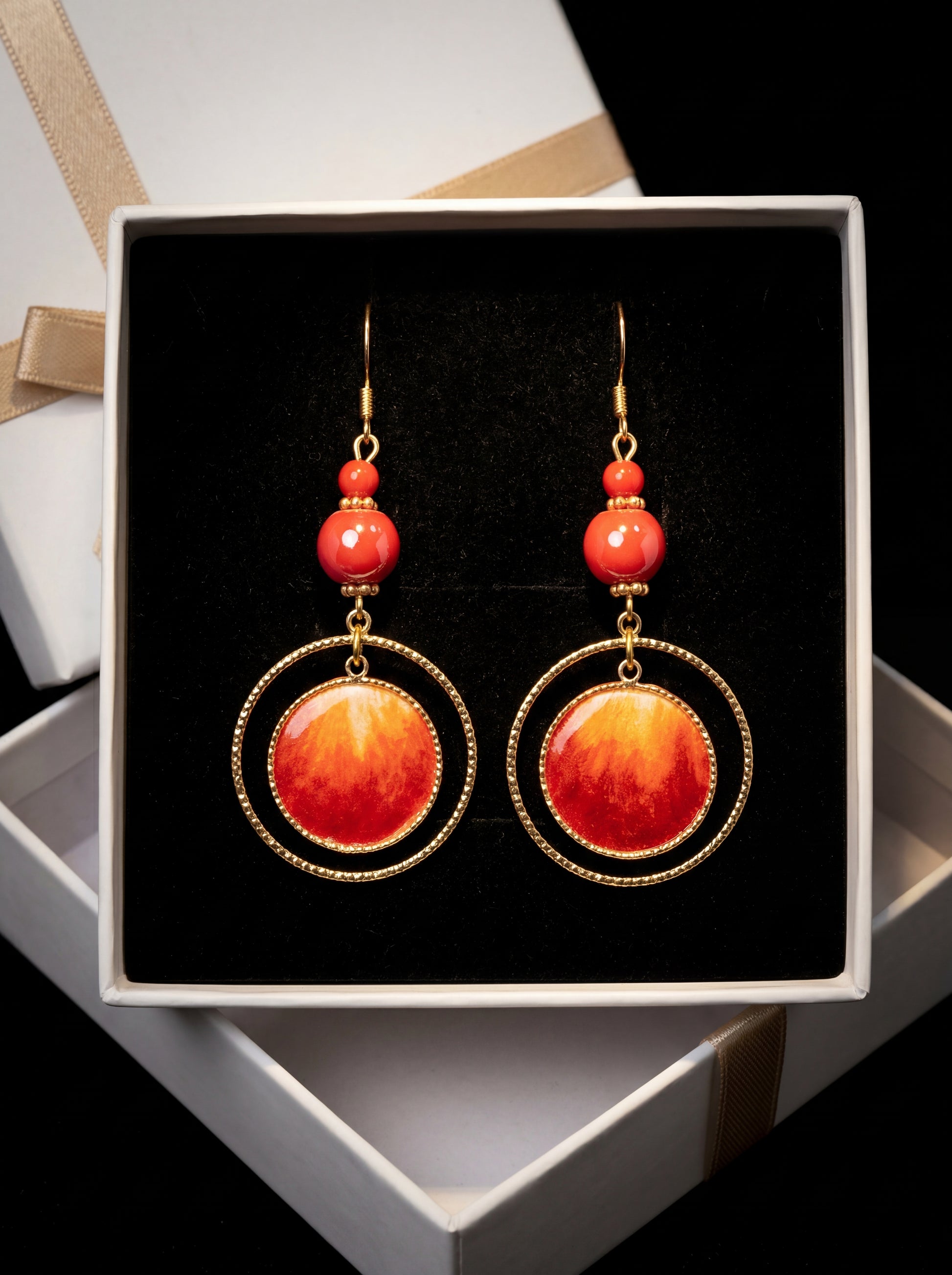 HECROWN 020 fiery sun earrings presented in a premium white gift box with a gold ribbon. A sincere, ready-to-gift handmade jewelry piece.