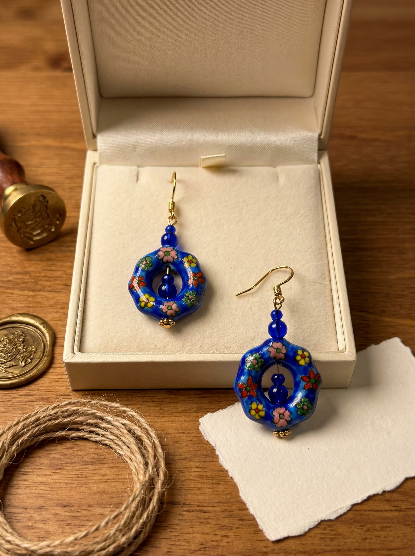 HECROWN 022 floral earrings in a luxury white gift box with a vintage gold wax seal and twine. A perfect anniversary or Valentine's Day gift.