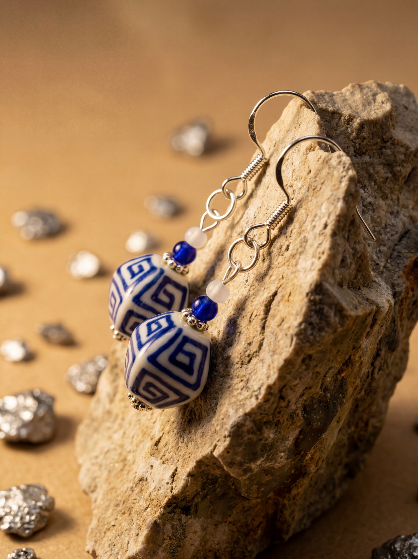 HECROWN hand-painted blue earrings on light linen with scattered blue glass beads. A soulful piece of Jingdezhen porcelain art.