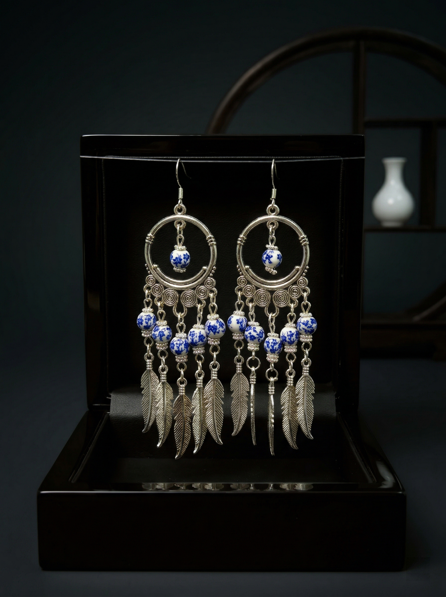 HECROWN 028 series phantom earrings in a premium white gift box with a vintage gold wax seal. A perfect anniversary or Valentine's Day gift.