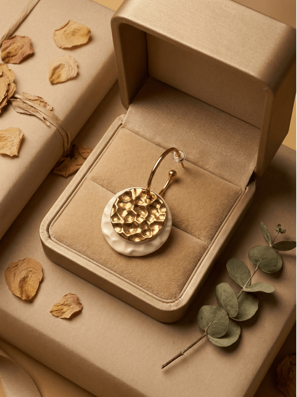 HECROWN 006 ceramic earring in a premium velvet-lined gift box with dried rose petals, representing a sincere and high-end handcrafted gift experience.